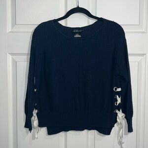 United States Sweater Women’s Blue sweater w/ side lacing. Size - Medium Petite